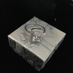 Sterling silver ring with white sapphires